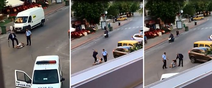 Şiddet sokağa indi, polisler yerdeki kadına copla vurup, tekmelediler